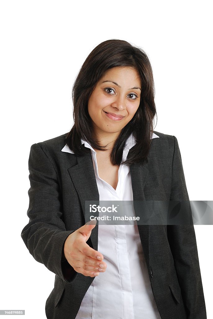 Business woman offering handshake This is an image of a business woman offering handshake. Achievement Stock Photo