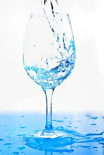 A glass of water isolated on a white background