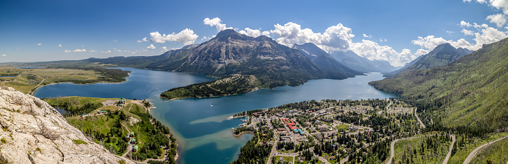 Stitched Panorama of the City of Waterton Lakes National Park During the Day, Alberta, Canada. View from Bear’s Hump trail lookout.