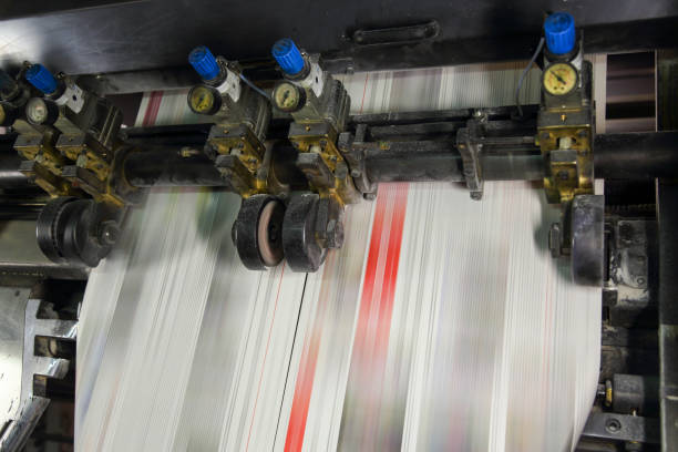 istock Newspaper printing press in a printing plant 1468205479
