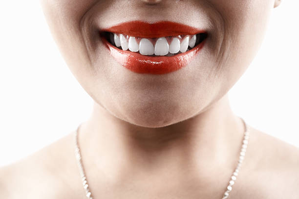 istock Grinning woman face 146820591