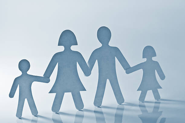 istock Family silhouette shadows hand holding 146820966