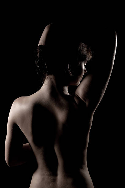 istock Slim woman on black background 146821054