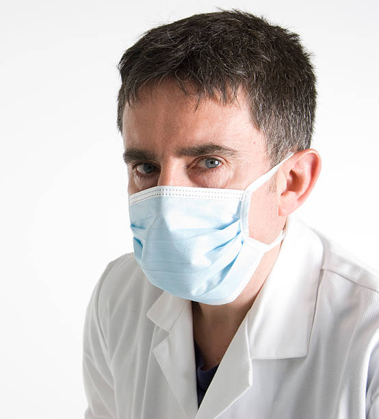 Close up of masked doctor stock photo