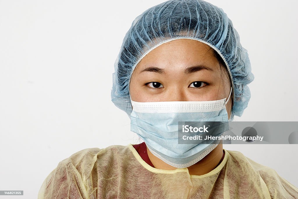 Medical Professional en ropa de trabajo protectora - Foto de stock de Adulto libre de derechos