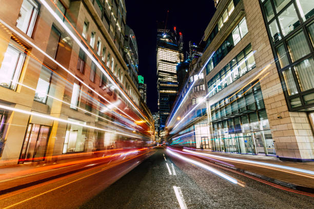istock Long exposure with light trails and modern architecture of downtown London 1468216658
