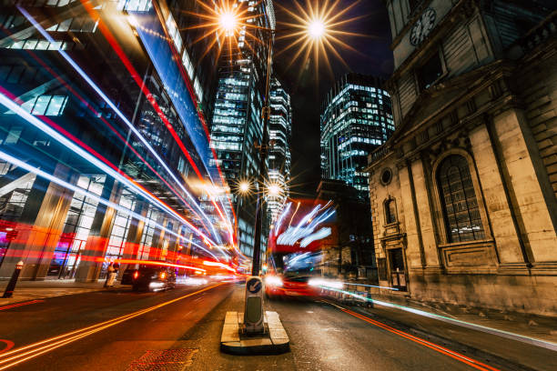 istock Long exposure with light trails and modern architecture of downtown London 1468216689