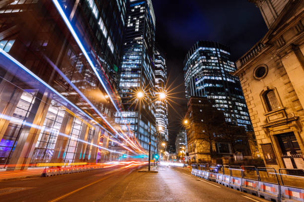 istock Long exposure with light trails and modern architecture of downtown London 1468216696