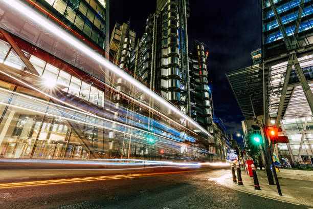 istock Long exposure with light trails and modern architecture of downtown London 1468216701