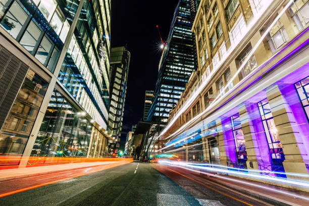 istock Long exposure with light trails and modern architecture of downtown London 1468216766