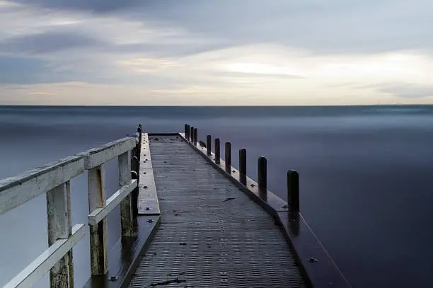 Photographed on a cold winter afternoon in Melbourne (you can see the skyline of the city on the right of the frame) with a long exposure through a neutral density filter.