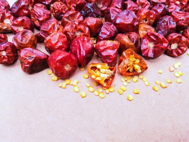 Dried round red chilli peppers whole hot chilly pepper an indian spice food ingredient lal boriya mirchi gol longi mirch dry piment rond, dried chile redondo, malagueta redonda, getrocknete runde Chili closeup image picture stockphoto guindillos rojos redondos secos pimiento picante entero un ingrediente alimenticio de especias indias lal boriya mirchi gol longi mirch seco piment rond, chile seco redondo, malagueta redonda, getrocknete runde chile primer plano imagen imagen stockphoto