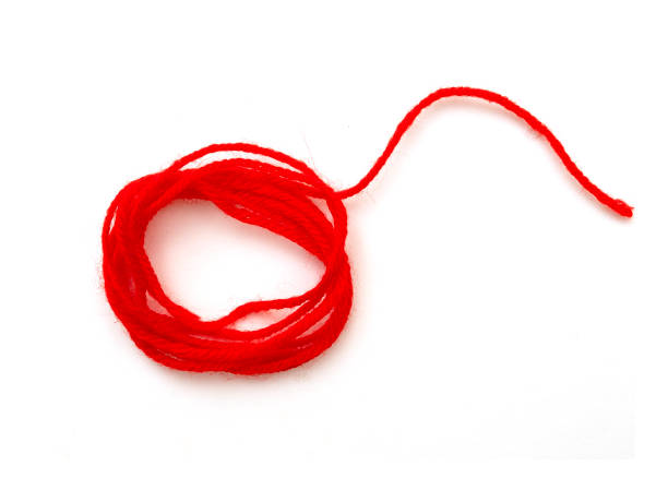 istock Skein of thin red string or rope isolated on white, top view 1468225367