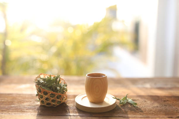 istock Stevia tea beverage drink in wooden cup 1468225974