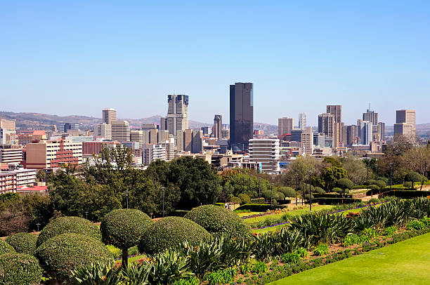 City of Pretoria Skyline, South Africa Pretoria is a city located in the northern part of Gauteng Province, South Africa. It is one of the country's three capital cities, serving as the executive (administrative) and de facto  national capital. Pretoria is situated approximately 50 km (30 miles) north of Johannesburg  in the north-east of South Africa. pretoria stock pictures, royalty-free photos & images