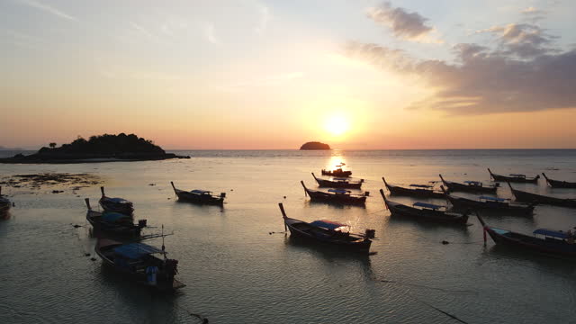 Aerial View Of Ocean And Silhouette Fishing Boats At Sunrise, Koh Lipe, Satoon, Thailand
