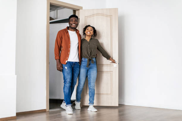 istock Joyful African American Spouses Entering New Home After Relocation 1468233407