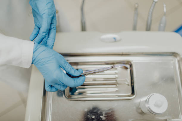istock High-angle view close-up of an unrecognizable hand using dentist's instruments 1468234773