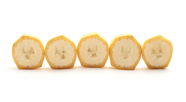 Cross Sections Of Banana Isolated On White Stock Photo - Download
