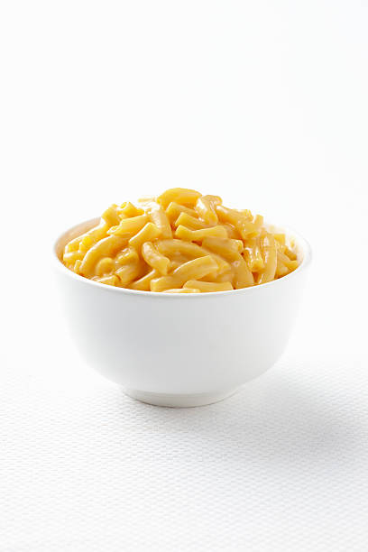 istock Macaroni and cheese in white bowl on white background 146823583