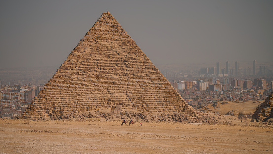 The pyramids with a blue sky in a desert area