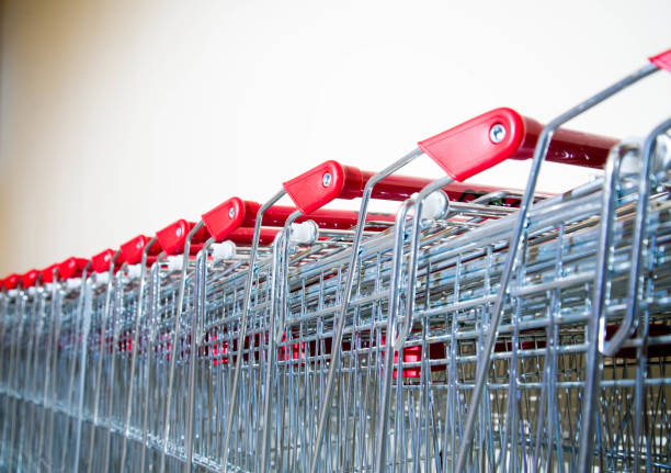 istock Shopping carts in a row in front of a mall. 1468237170