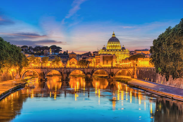 Rome Vatican Italy sunset city skyline at Tiber River stock photo