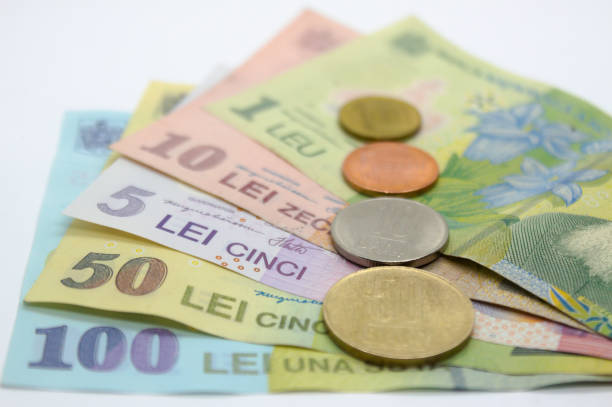 istock Romanian currency notes and coins 100 RON, 50 RON, 10 RON, 5 RON, 1 RON . LEI, 50 bani, 10 bani, 5 bani, 1 ban LEU 1468239638