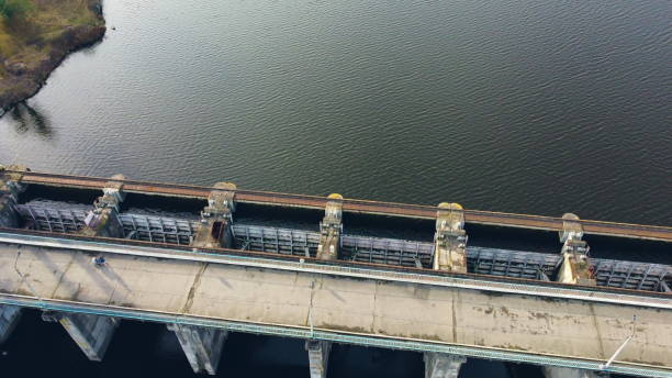 istock Aerial Drone View Dam on River. Top view Hydroelectric Dam. 1468239754