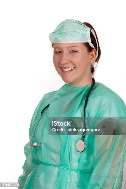 Foto de Jovem Sorrindo Doutor Cirúrgica e mais fotos de stock de Adulto - Adulto, Cirurgião, Doutor