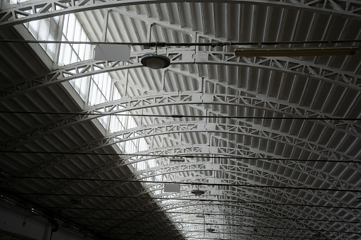 empty modern storehouse ceiling. Ceiling lights