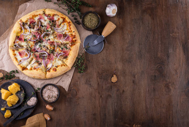 istock Italian pizza carbonara with bacon and herbs 1468240989