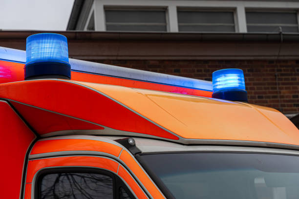 istock Low angle view of emergency ambulance car with blue light 1468241185