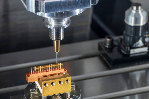 istock Close up scene the CNC milling machine cutting the copper electrode parts with solid ball end mill. 1468241344