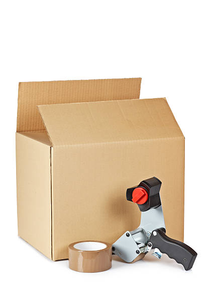 istock Packaging tape dispenser and shipping box 146824294