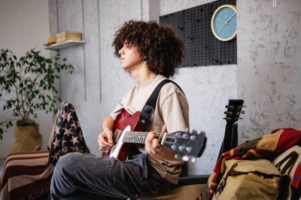 istock Boy enjoys electric guitar play 1468243564
