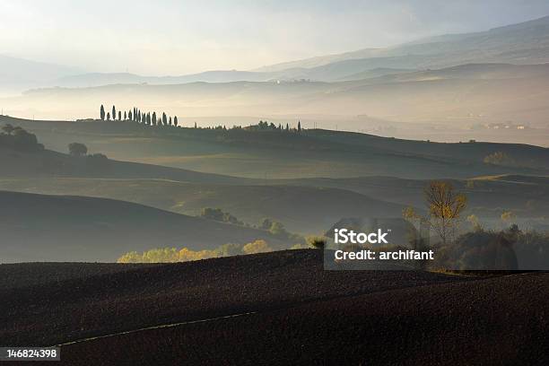 Misty Dawn View At Early Morning In Val Dorcia Stock Photo - Download Image Now - Aurora Polaris, Color Image, Coniferous Tree