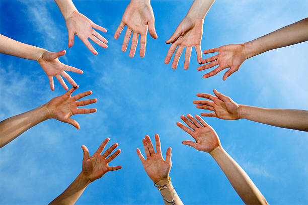 istock hands of team and the sky 146824492
