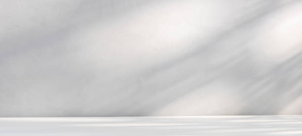 istock Sunlit concrete countertop and wall with natural light 1468246447