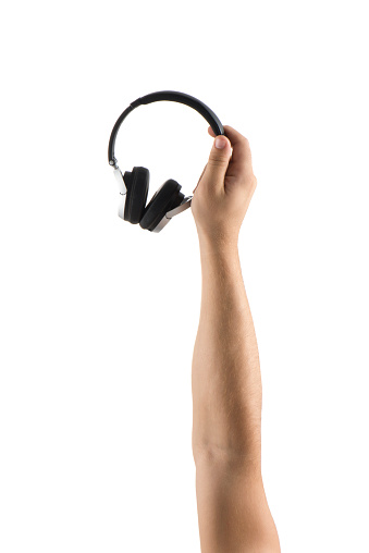 man holding wireless headphones with Clipping path on white background