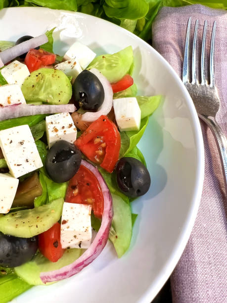 istock Greek salad with fresh vegetables closeup 1468247682