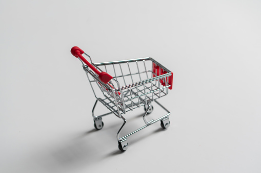 Black shopping cart isolated on white background