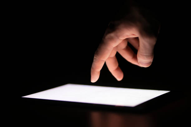 istock human hand touching the screen and push the button on mobile device 1468249919