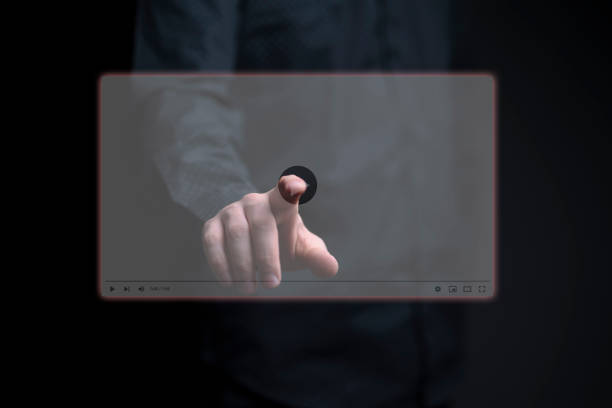 istock internet video streaming, hand push the play button on the video 1468249963
