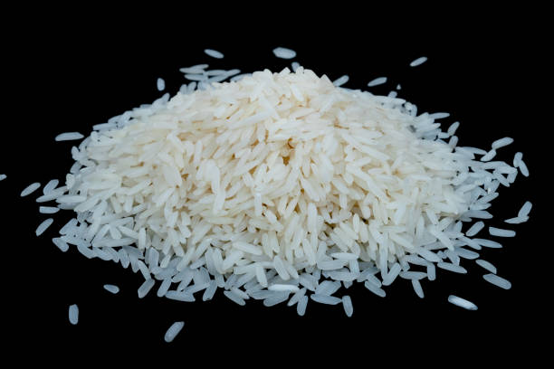 istock Heap of rice on a black background 1468252576