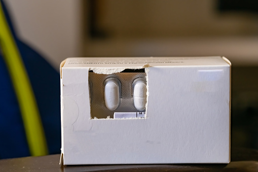 White box with pills