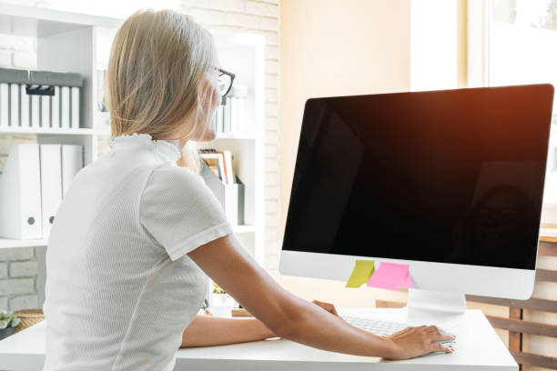 istock Stay safe and working from home. Young woman working at home. 1468254656