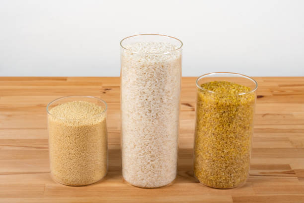istock Glass storage jars full of couscous, rice and bulgur on a table 1468259942