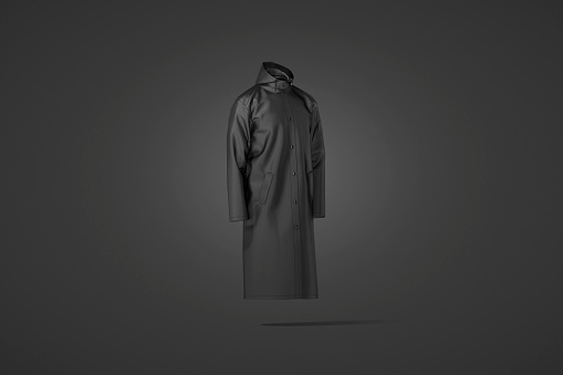 Blank black protective raincoat mockup on dark background, 3d rendering. Empty casual protection windbreaker or bomber mock up, side view. Clear down jacket with hood for autumn template.
