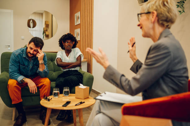 istock Diverse couple on a therapy session in a psychologist office 1468261937